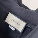 Gucci Hooded dress with Gucci logo star print 610144