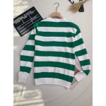 626051 Gucci Striped knit cotton cardigan with GG