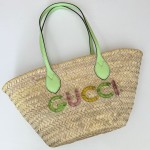 SMALL STRAW TOTE WITH GUCCI LOGO 779524