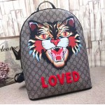 Gucci Angry cat print GG Supreme backpack 419584