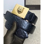 Gucci GG signature leather belt with feline buckle black  429021