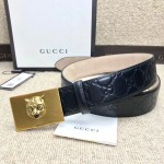 Gucci GG signature leather belt with feline buckle black  429021