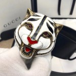 Gucci Leather belt with feline head 499639