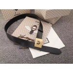 Gucci Leather belt with feline buckle black 429021