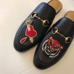 Gucci Princetown slipper with appliqués 463475