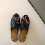 Gucci Princetown slipper with appliqués 463475