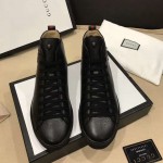 Gucci Leather high-top with tiger sneaker 451621