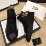 Gucci Leather high-top with tiger sneaker 451621