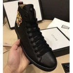 Gucci Leather high-top with tiger sneaker 451621