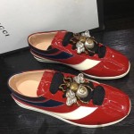 Gucci Falacer patent leather sneaker with Web 493692