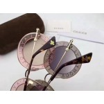 Gucci Round-frame metal sunglasses 470459-7587