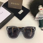 Gucci Cat eye acetate sunglasses with stars 470463-1011