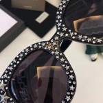 Gucci Cat eye acetate sunglasses with stars 470463-1011