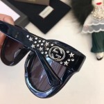 Gucci Cat eye acetate sunglasses with stars 470463-1011