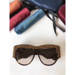 Gucci Cat eye acetate sunglasses with stars 470467-2320