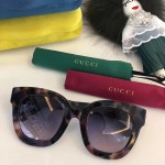 Gucci Round-frame acetate sunglasses with star 491408-2325