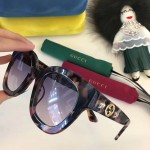 Gucci Round-frame acetate sunglasses with star 491408-2325