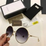 Gucci Round-frame metal sunglasses 506149