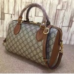 Gucci GG Supreme top handle bag brown