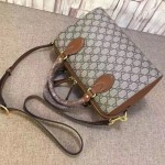 Gucci GG Supreme top handle bag brown