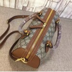 Gucci GG Supreme top handle bag brown