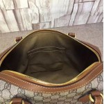 Gucci GG Supreme top handle bag brown