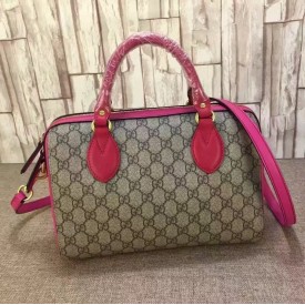 Gucci GG Supreme top handle bag fuchsia 409529