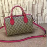 Gucci GG Supreme top handle bag fuchsia 409529