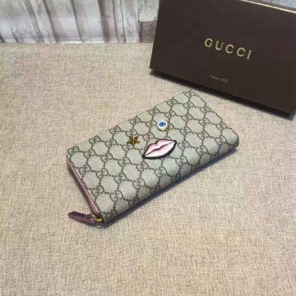 Gucci Zip around wallet with embroidered face 431392