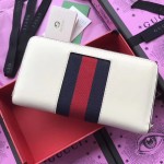 Gucci Sylvie leather zip around wallet white 476083